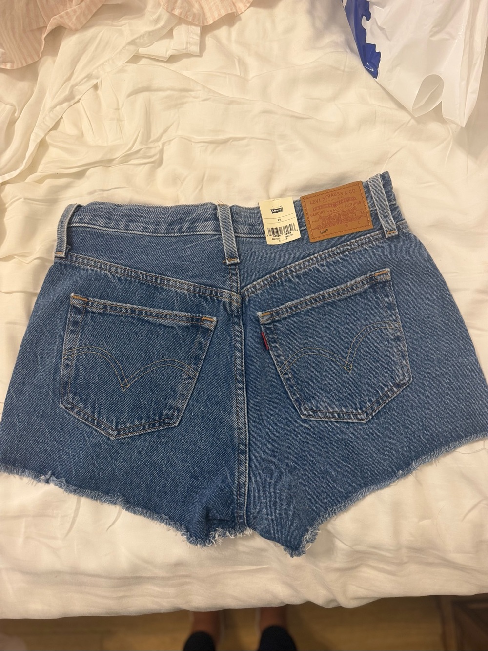 Levi's Medium Blue Denim Cutoff Shorts with Frayed Hem